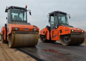 Машинист катка